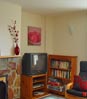 Fowey Cottage Lounge: tv, DVD player and bookcase